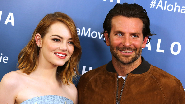 Emma Stone and Bradley Cooper smiling